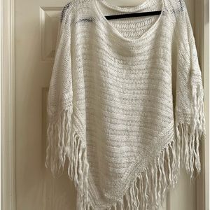 One Size Fits All with this soft and flowing Poncho. Perfect for summer nights.
